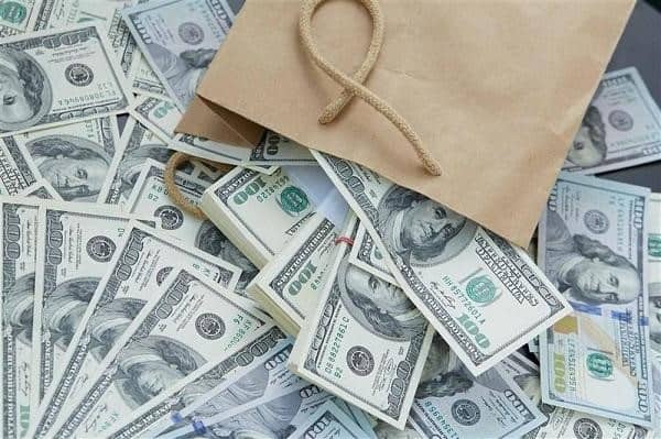 Nằm mơ thấy tiền đô đánh con gì và điềm báo gì?